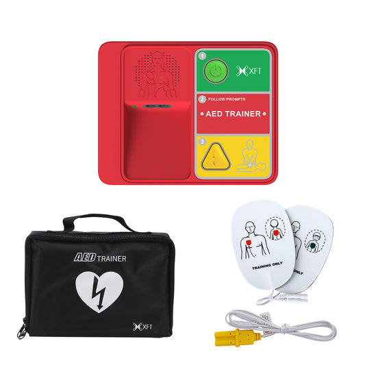 The XFT-120N lightweight AED trainer shown with its black carrying case and practice pads