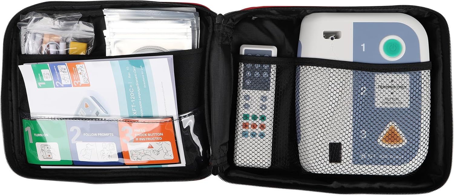 Organized carrying case for the AED trainer, shown open with first aid supplies